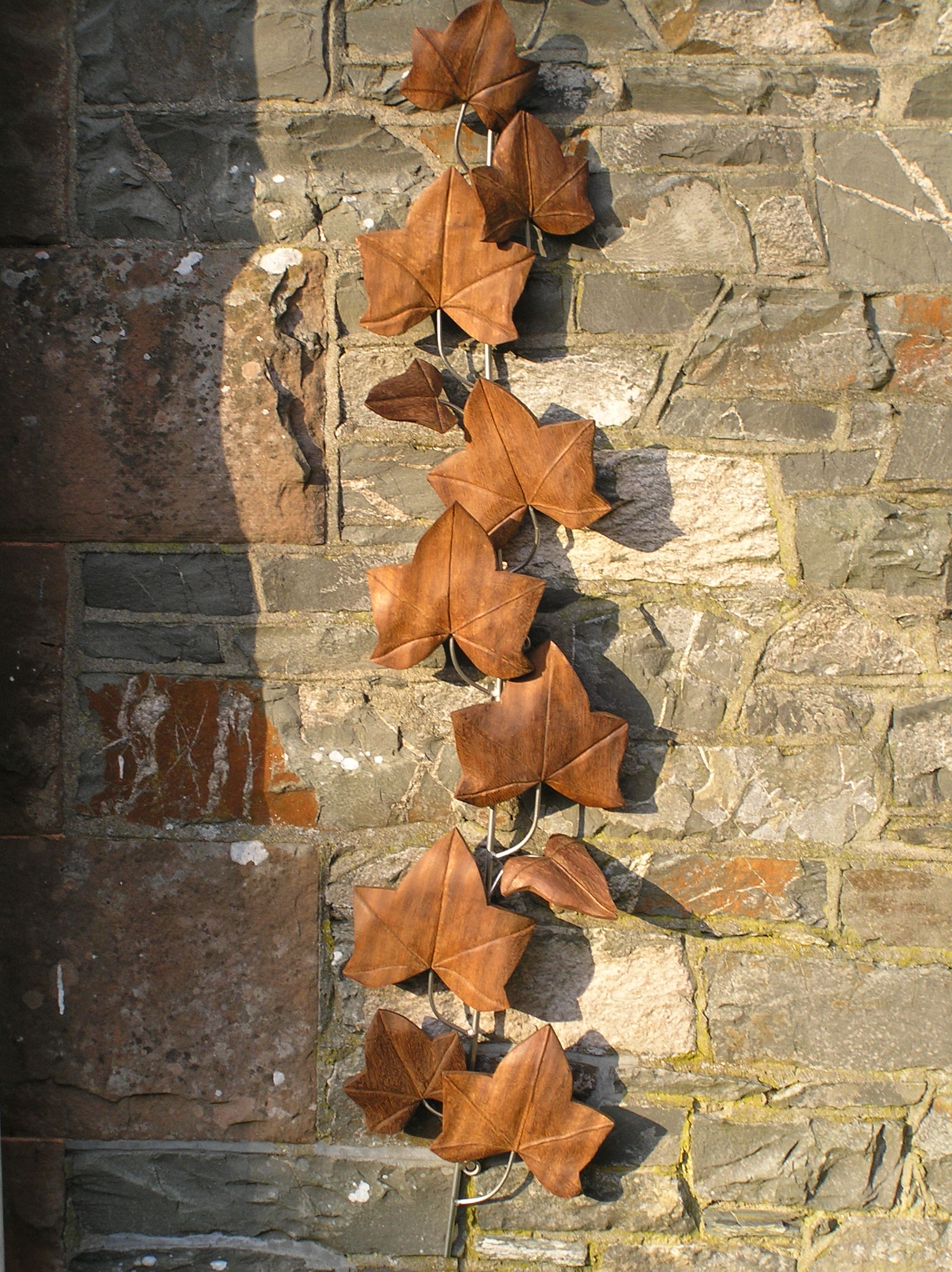ivy leaves, garden sculpture, reclaimed wood, teak, stainless steel, custom made, hand carved, wall hanging,