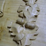 oak leaves and acorns, hand carved, lime wood, plaque, detail, bespoke carving, commemorative plaque,