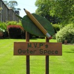 school garden sign, hand carved, solid oak, school playground, sculpture, friendship bench, eco garden, designed by pupils, made in Scotland,