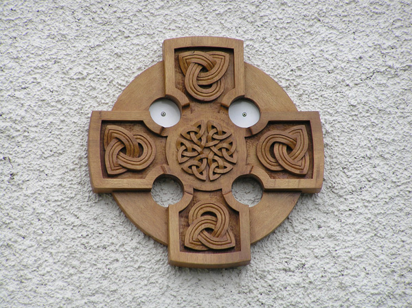 celtic cross, round, solid oak, celtic design, hand carved, sculpture, knotwork, carving, bespoke, custom made, made for a church wall,