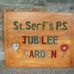 Jubilee garden sign, school playground, eco garden, sign, oak, hand-carved, hand-painted, friendship garden, designed by pupils, outdoor learning,